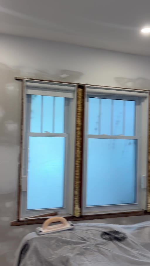 Drywall finishing and pot lights during an interior renovation