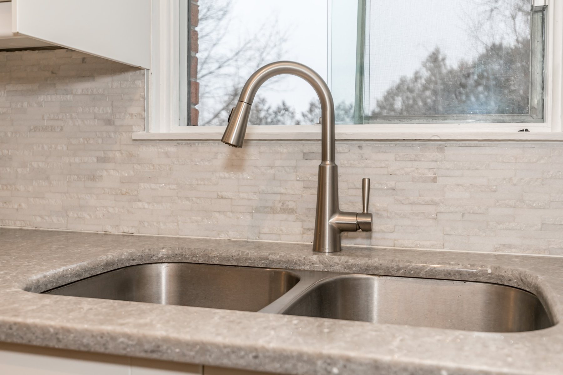 Sink, counter and backsplash in the completed Hilltop kitchen
