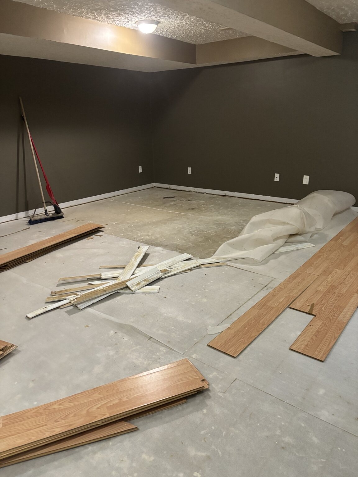 Old Pond Mills lower-level flooring being removed