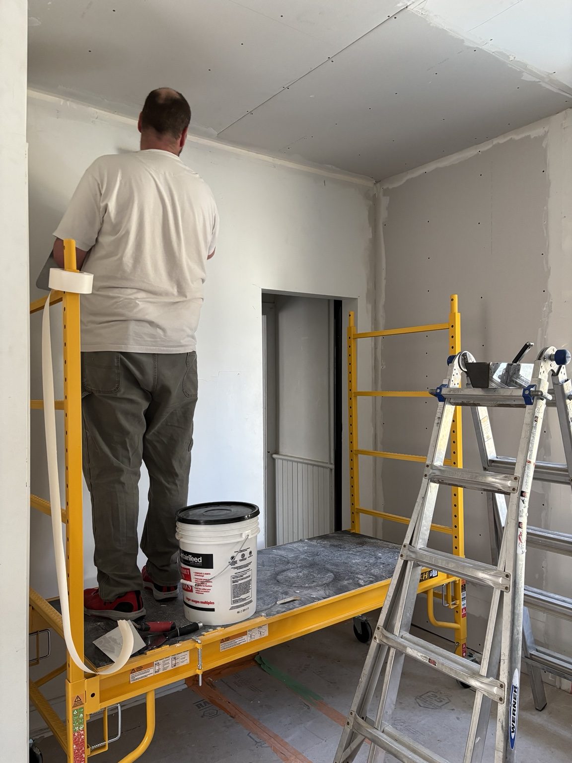 Drywall and ceiling finishing in progress
