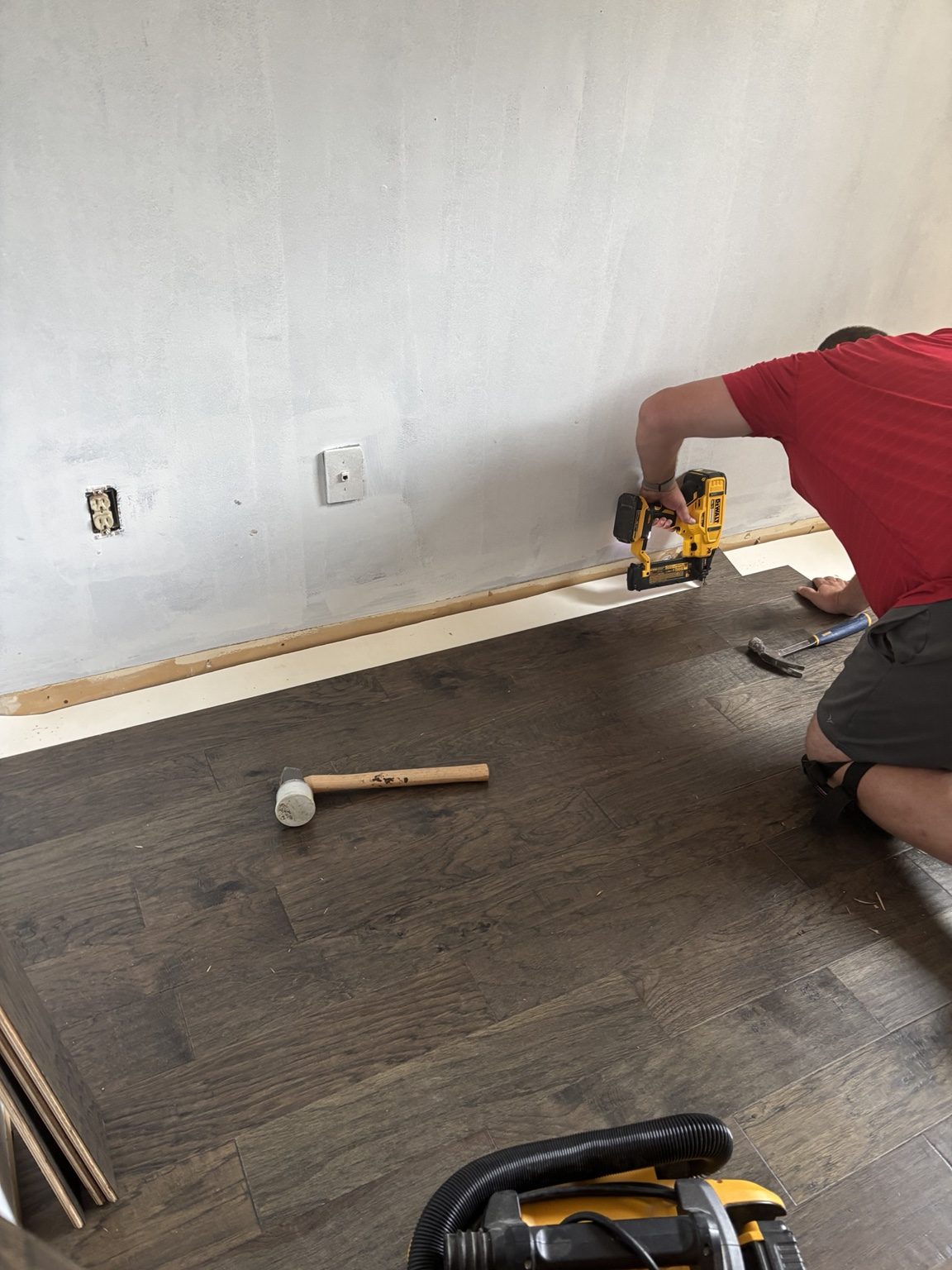 Engineered wood flooring installation in progress