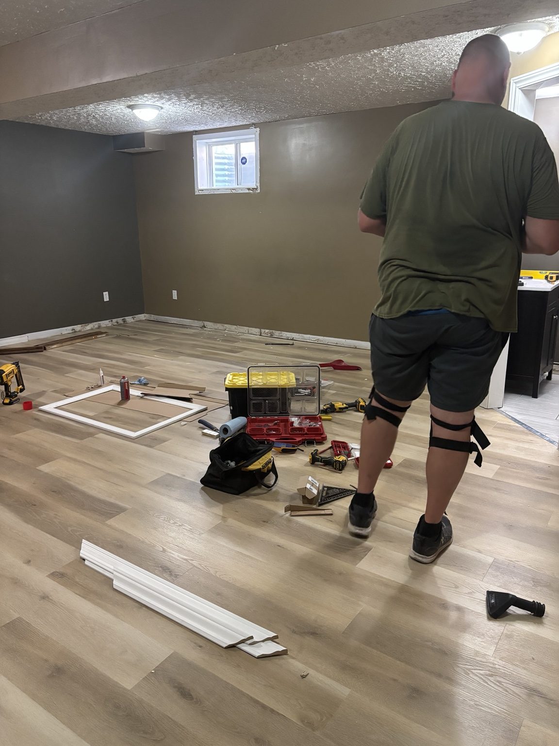Wood-look flooring installation in progress