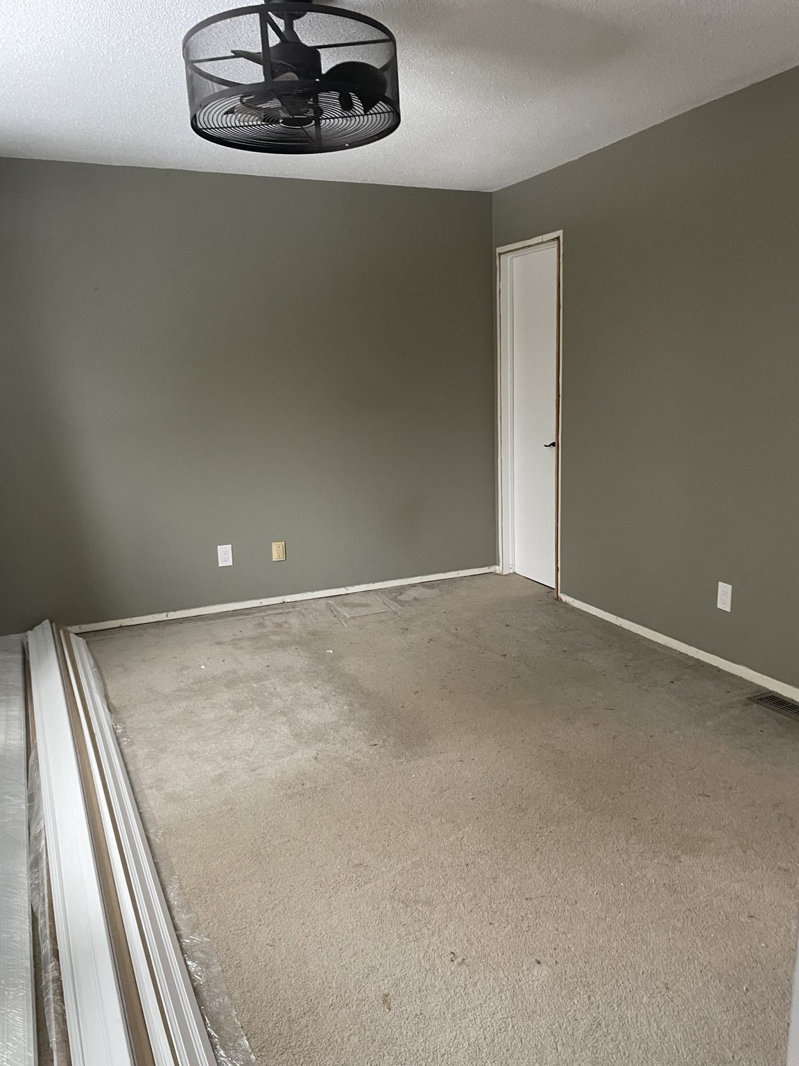Existing carpet documented before flooring work