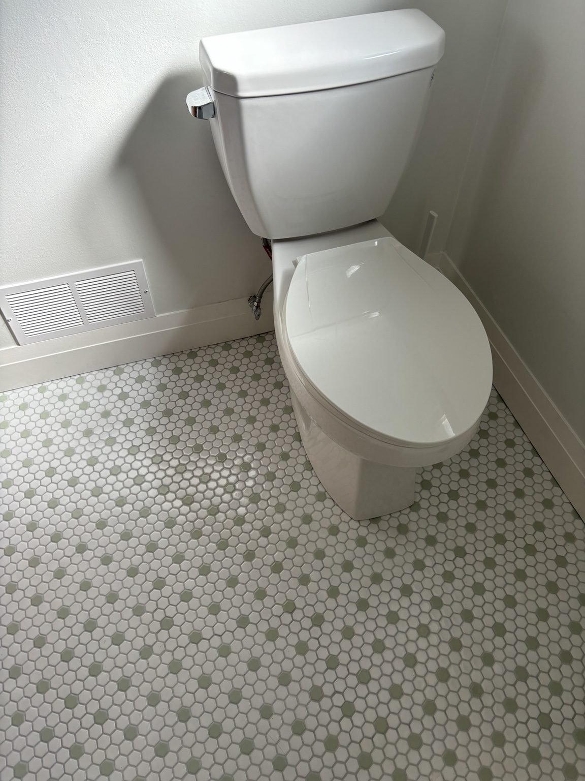 Bathroom toilet and flooring installation detail