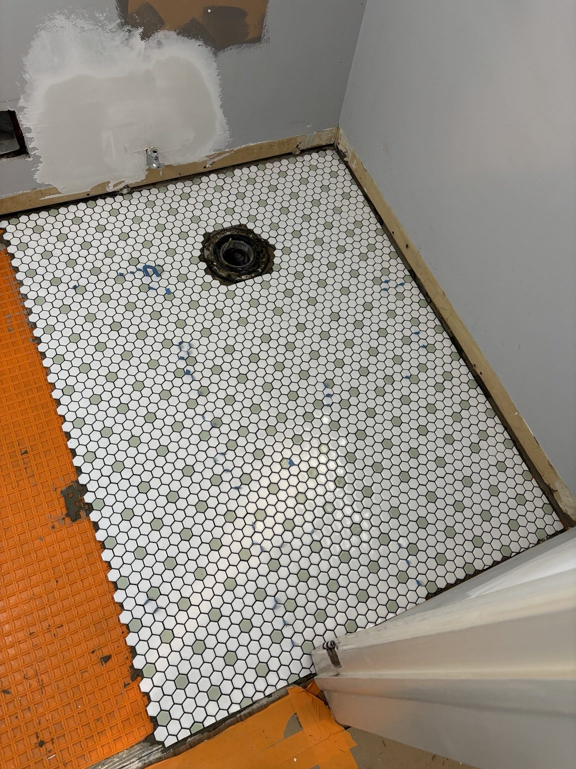 Bathroom tile and shower preparation in progress