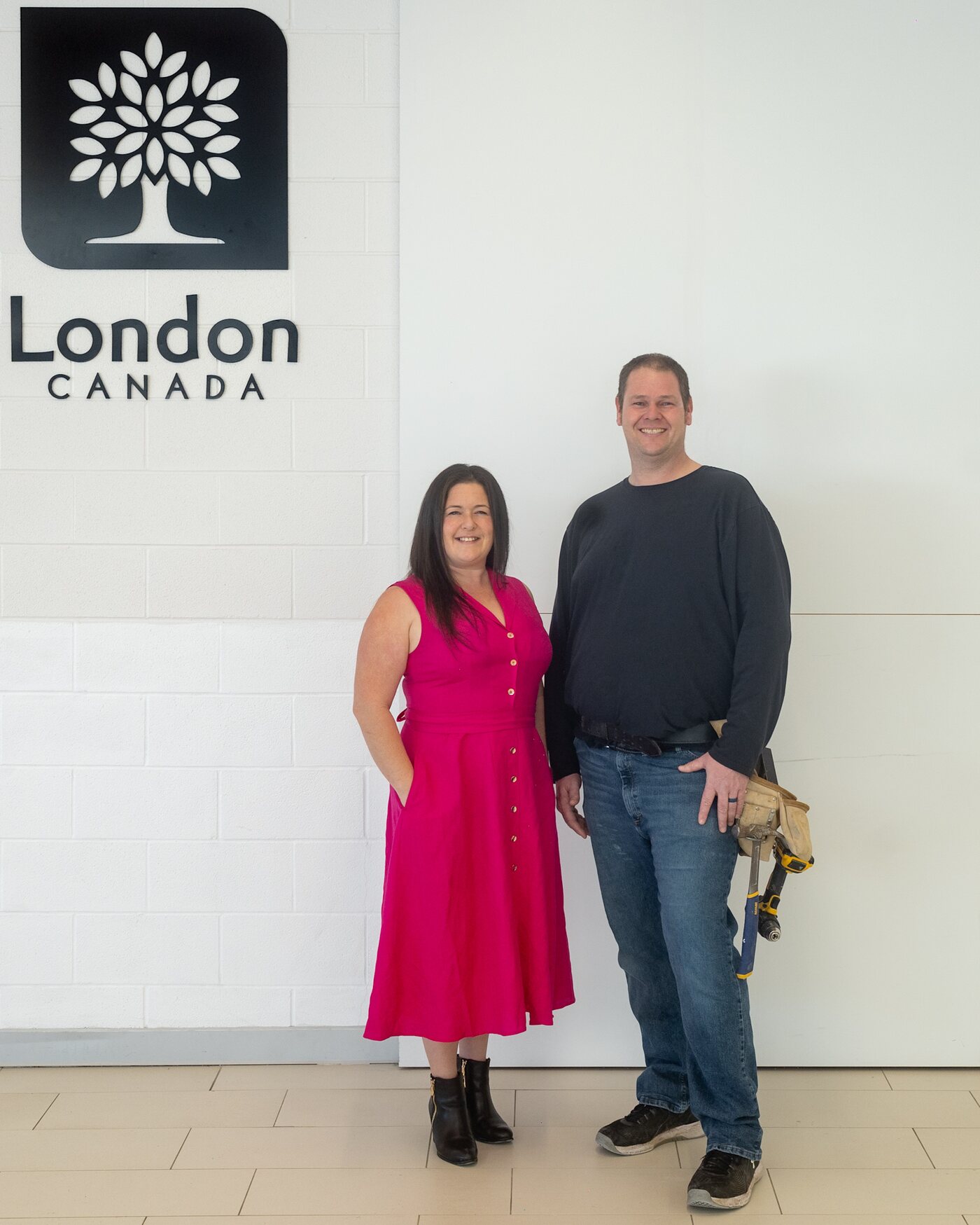 Steph and Rene Hekman standing together beside the London Canada sign