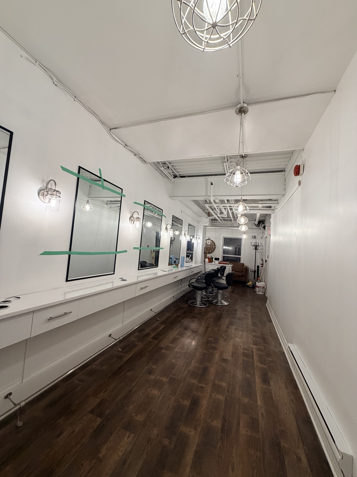 Long view through the restored London salon interior