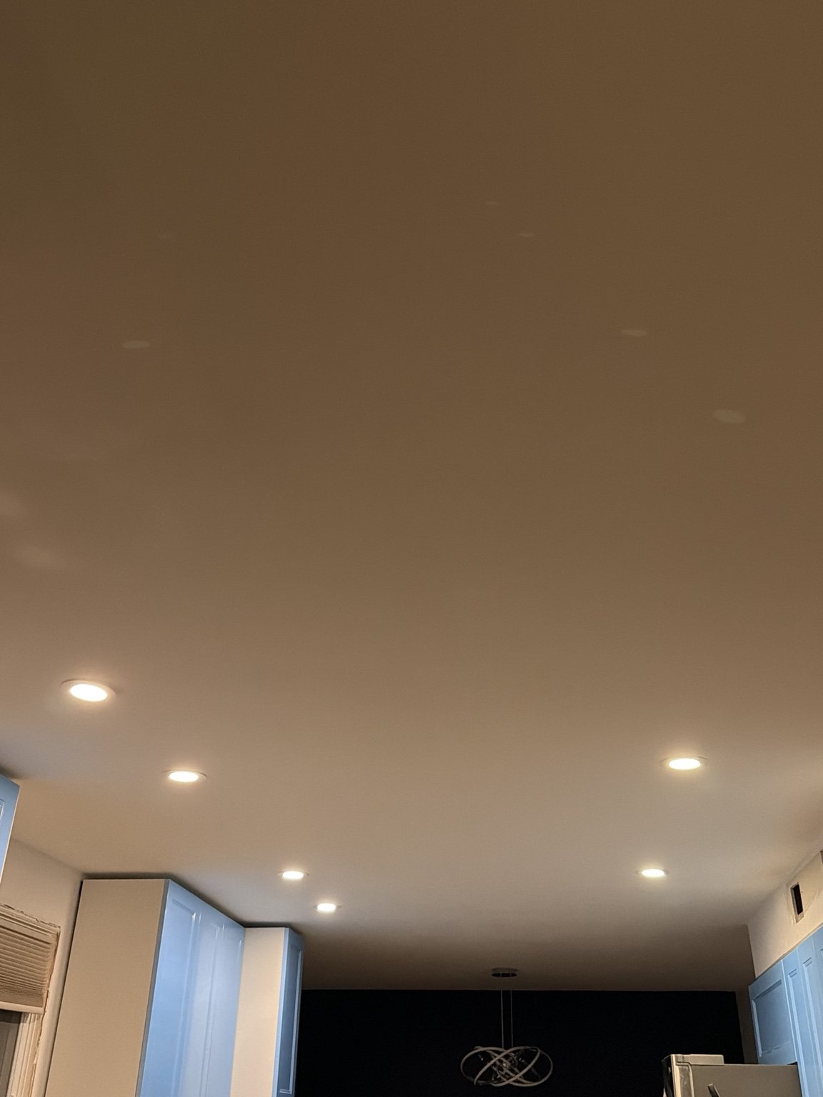 New pot lights installed across the Westmount main-floor ceiling